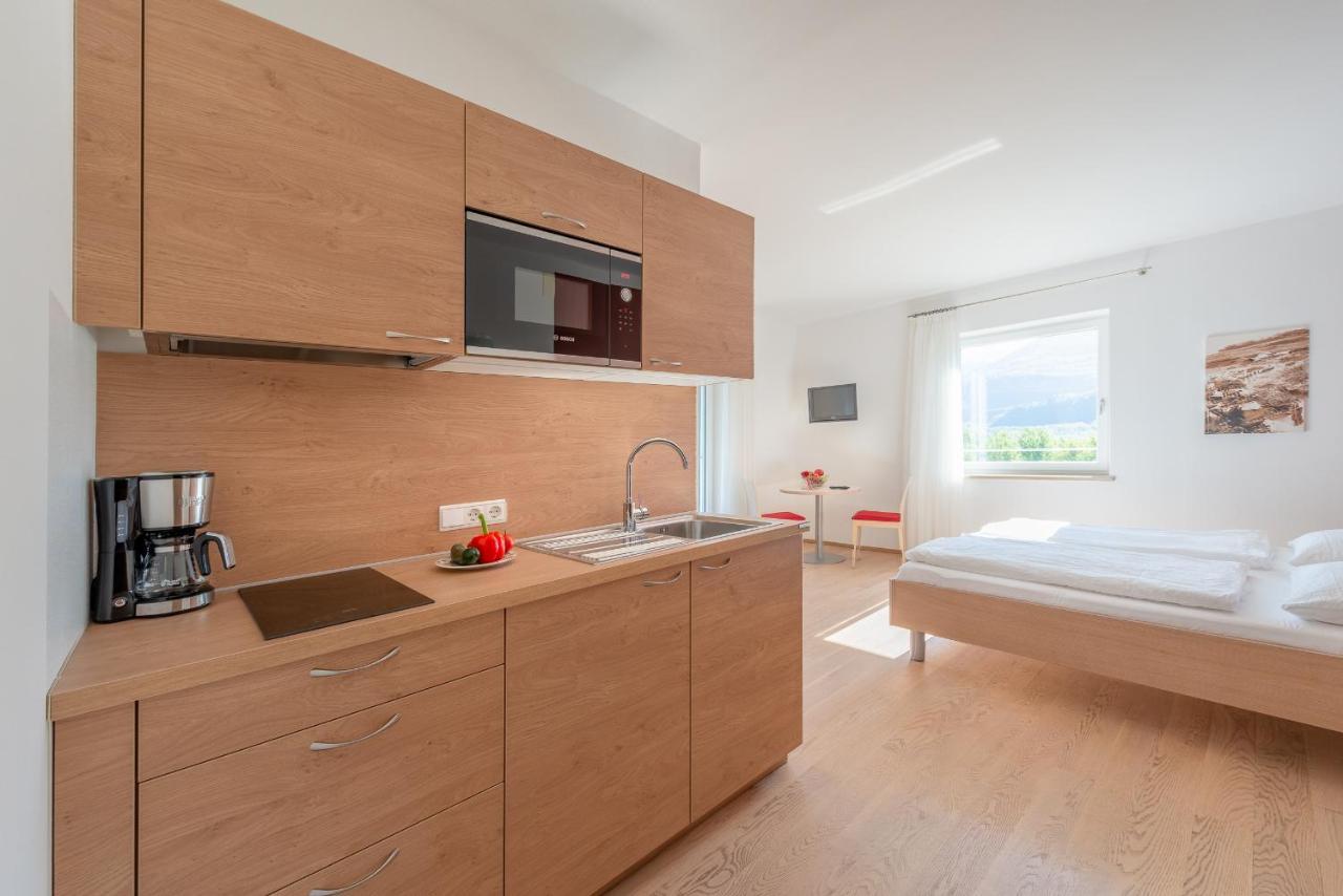 Sandhof Ferienwohnungen Termeno Esterno foto
