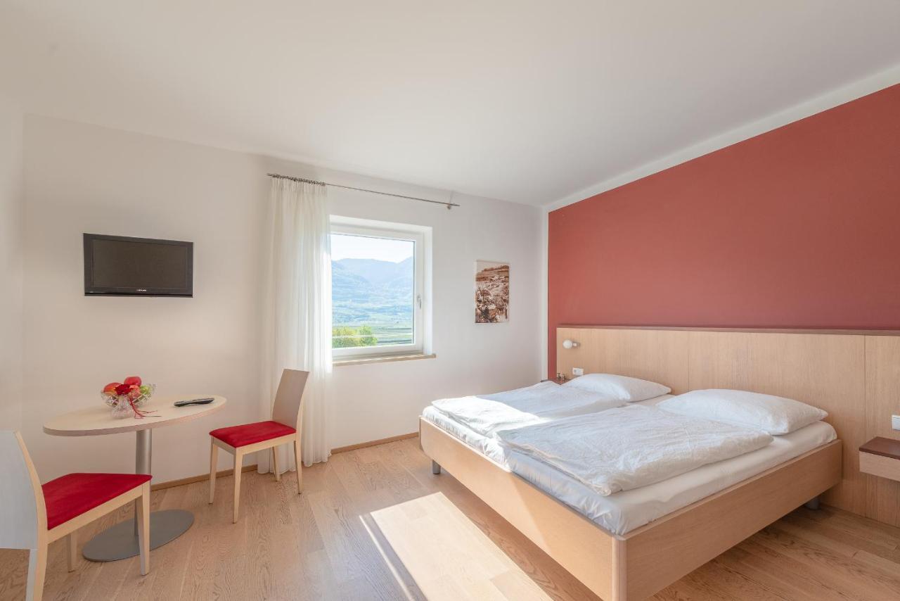 Sandhof Ferienwohnungen Termeno Esterno foto