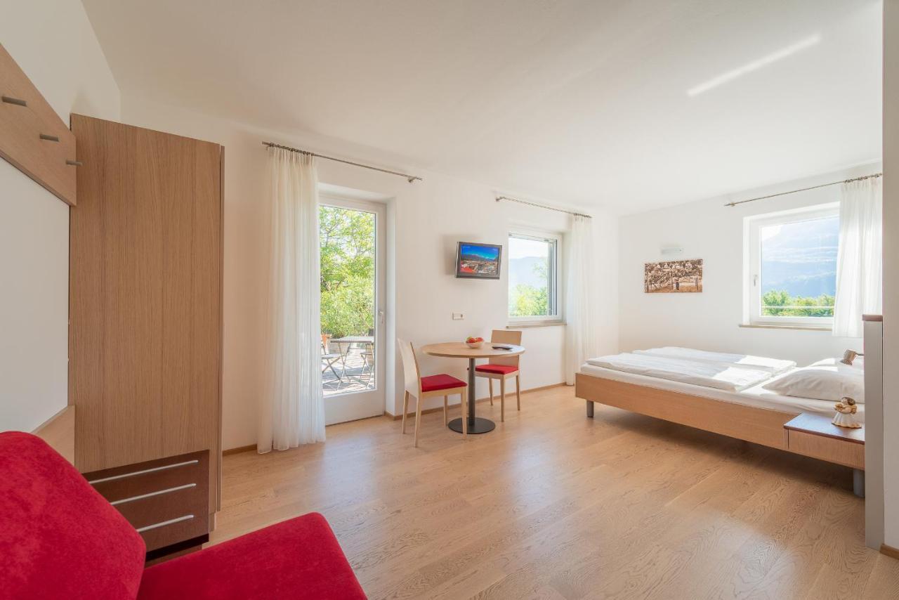 Sandhof Ferienwohnungen Termeno Esterno foto