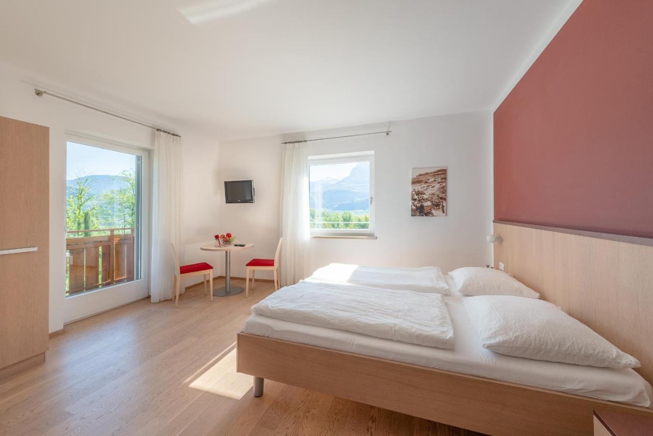 Sandhof Ferienwohnungen Termeno Esterno foto