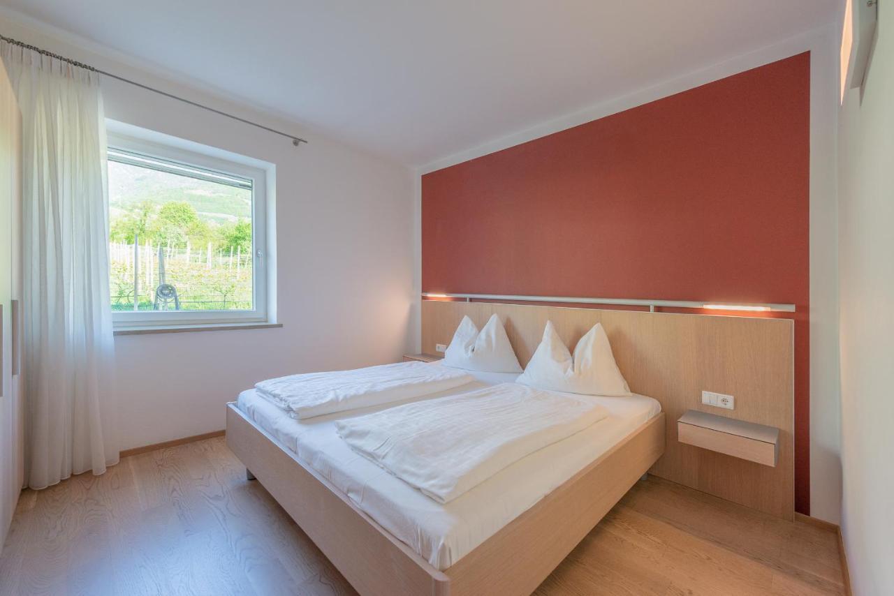 Sandhof Ferienwohnungen Termeno Esterno foto